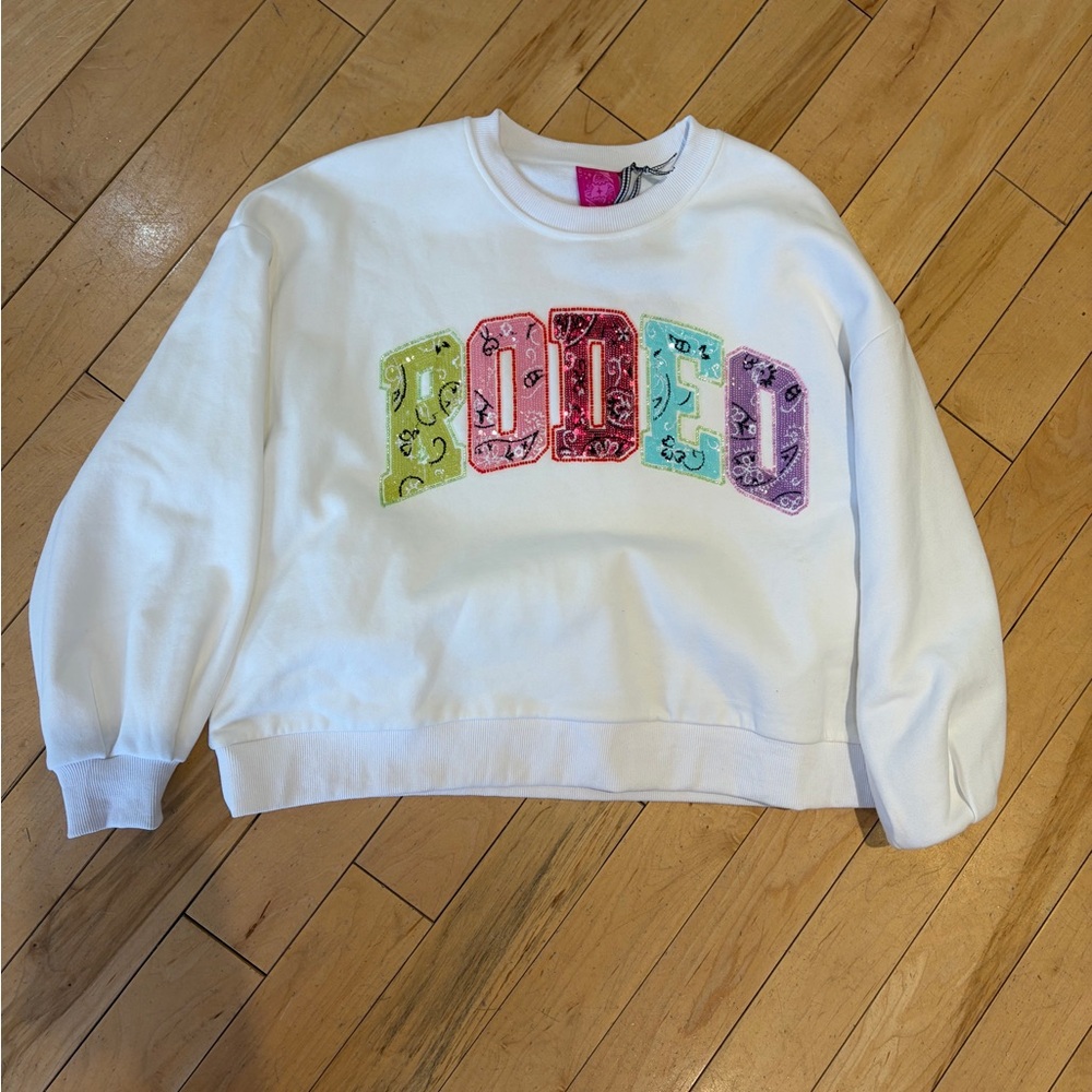 Queen of sparkles white sweatshirt with rodeo in the front